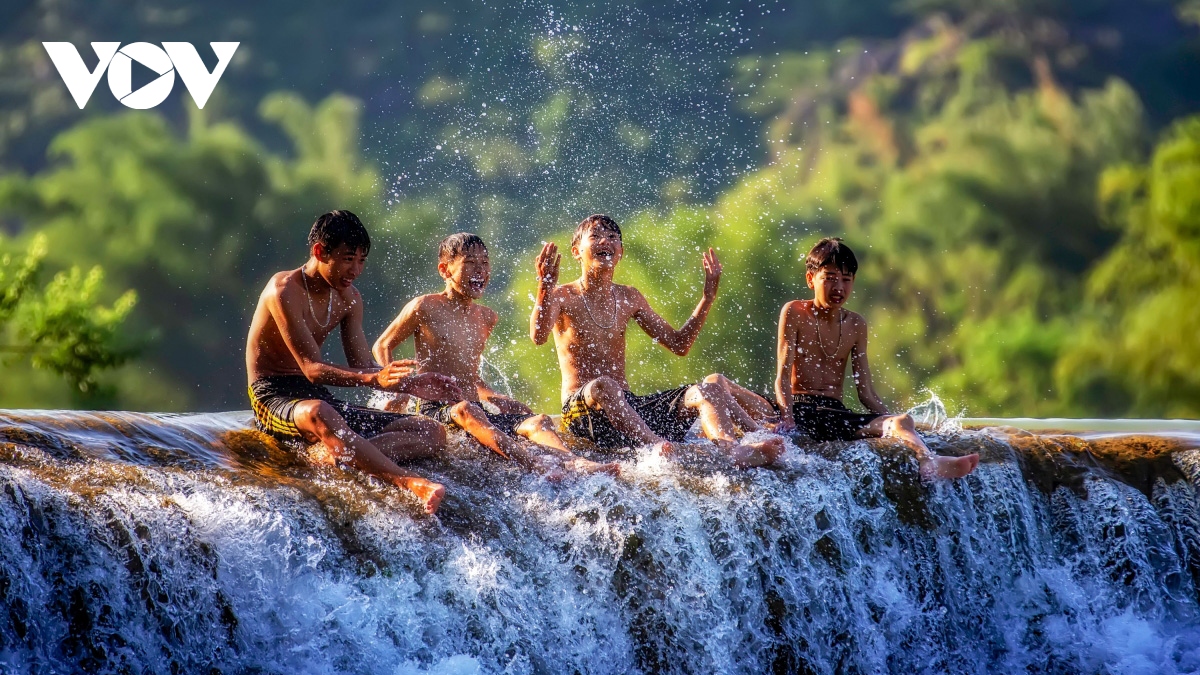 Ethnic children enjoy summer time in northern mountainous region